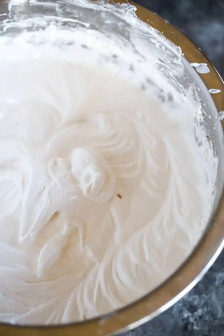A bowl with seven minute frosting in it.