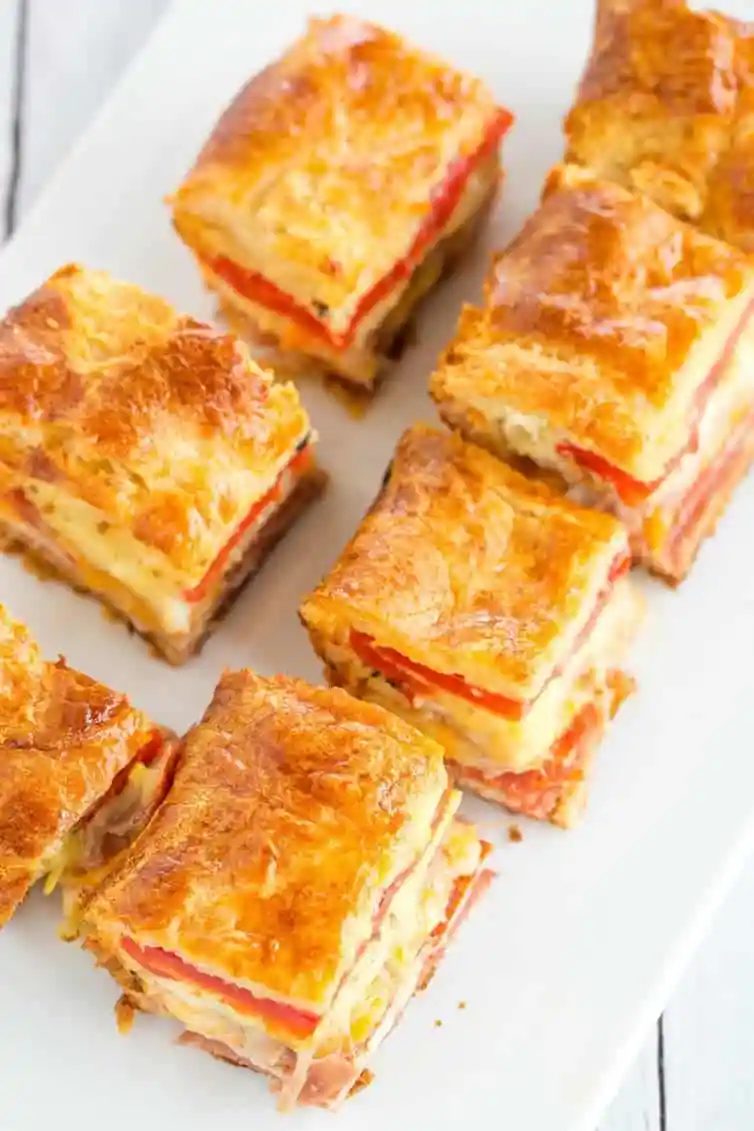 This straightforward antipasto appetizer bake features layers of Italian meats and cheese, sandwiched between layers of crescent dough. Great for parties!