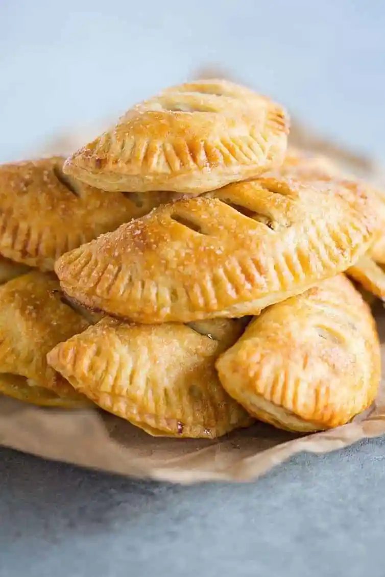 Apple Hand Pies - A flaky pastry crust filled with cooked apples!