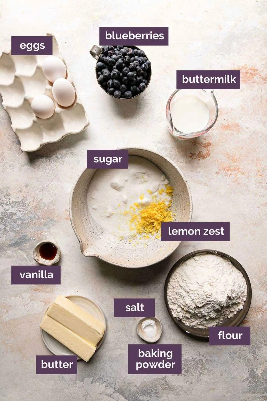 Ingredients for lemon blueberry bundt cake prepped and labeled.