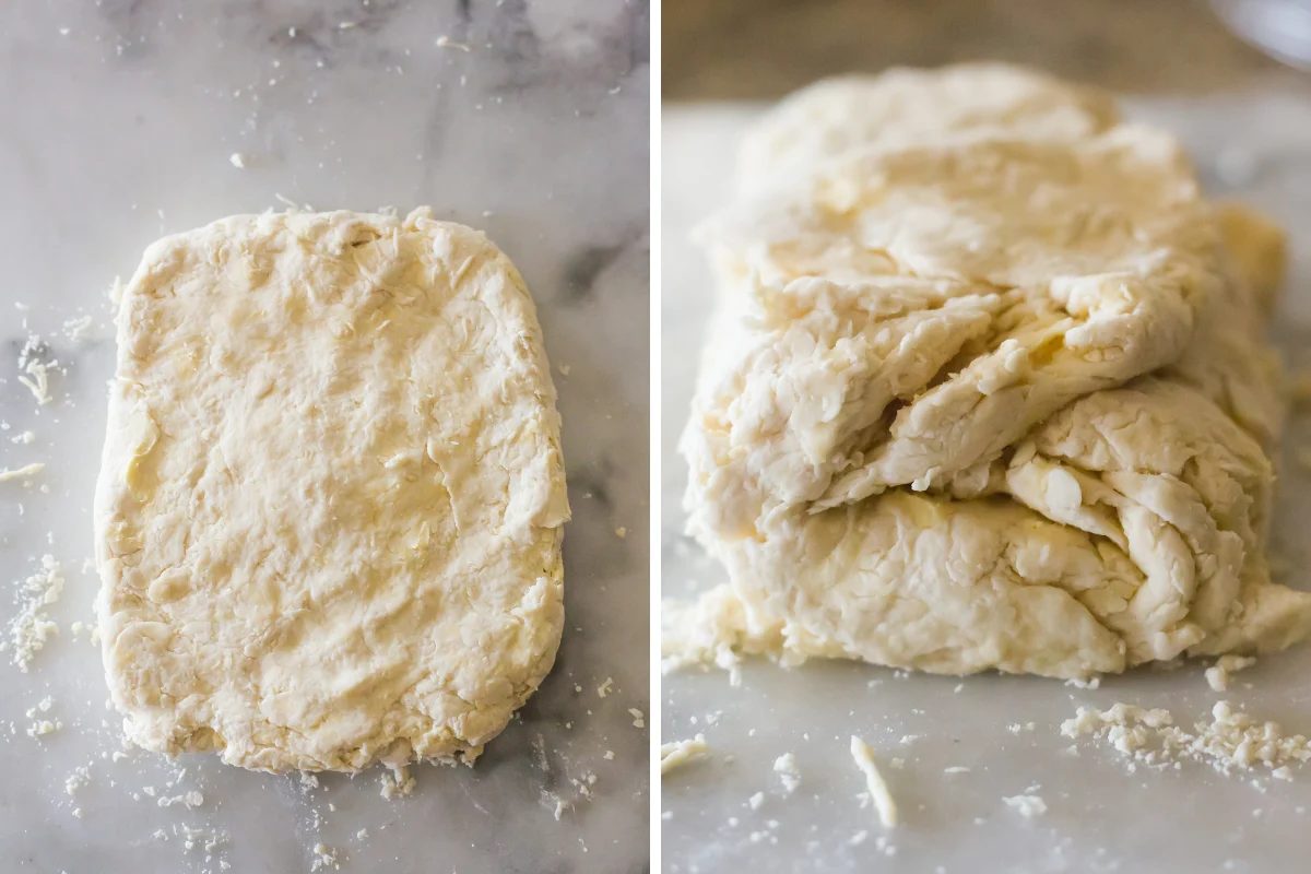 Image of a rectangle of biscuit dough folded into thirds envelope-style.