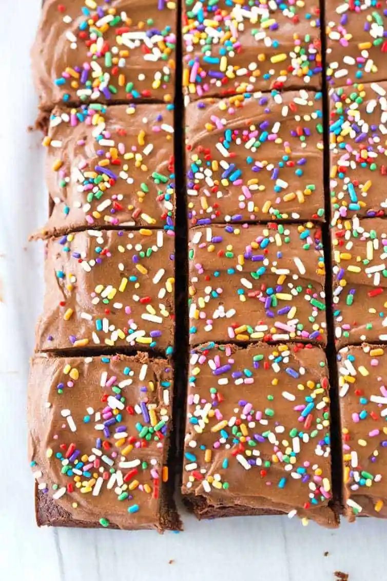 These chocolate frosted brownies start with fudge brownies and are topped with a chocolate buttercream frosting (with a secret ingredient!).