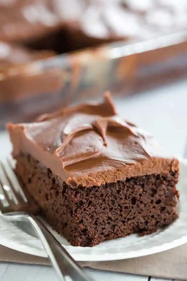 This fabulous chocolate sheet cake only requires one pot for mixing and is topped with the most memorable milk chocolate ganache frosting.