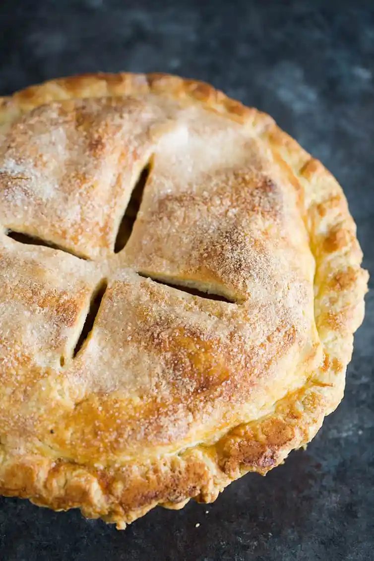 An overhead shot of a baked apple pie.