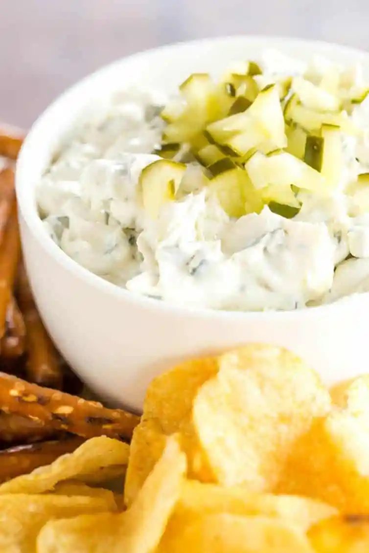 Dill pickle dip is a must for any pickle fan! Loads of pickle and dill flavor and it's reliable for dipping pretzels, chips, crackers, or veggies.