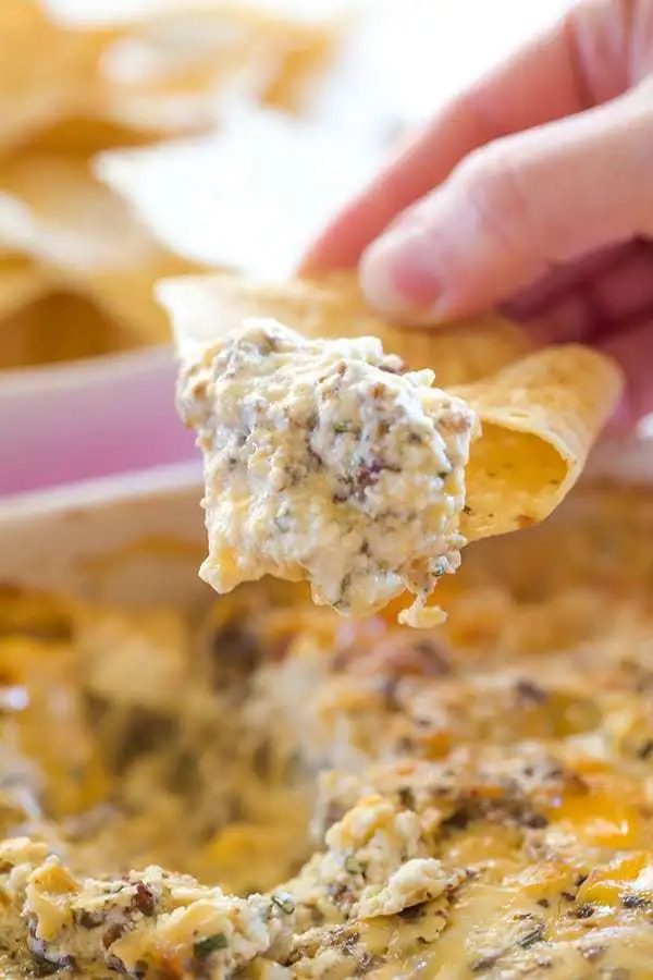 This "Hissy Fit Dip" with the crazy moniker is a HUGE party hit - sausage, cream cheese, sour cream, two cheeses, chives and seasonings make this one absolutely irresistible! |