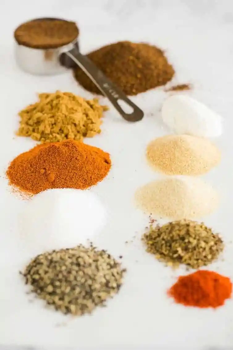 All of the spices lined up and ready to be mixed together for From-scratch Taco Seasoning.