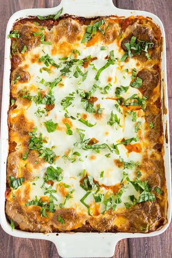 An Italian spin on traditional Greek pastitsio with layers of pasta, meat, cream sauce, and cheese. A rich recipe reliable for company!