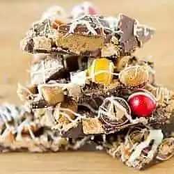 Stack of pieces of leftover Halloween chocolate candy bark.