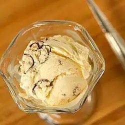Overhead image of malted milk ice cream in a glass.