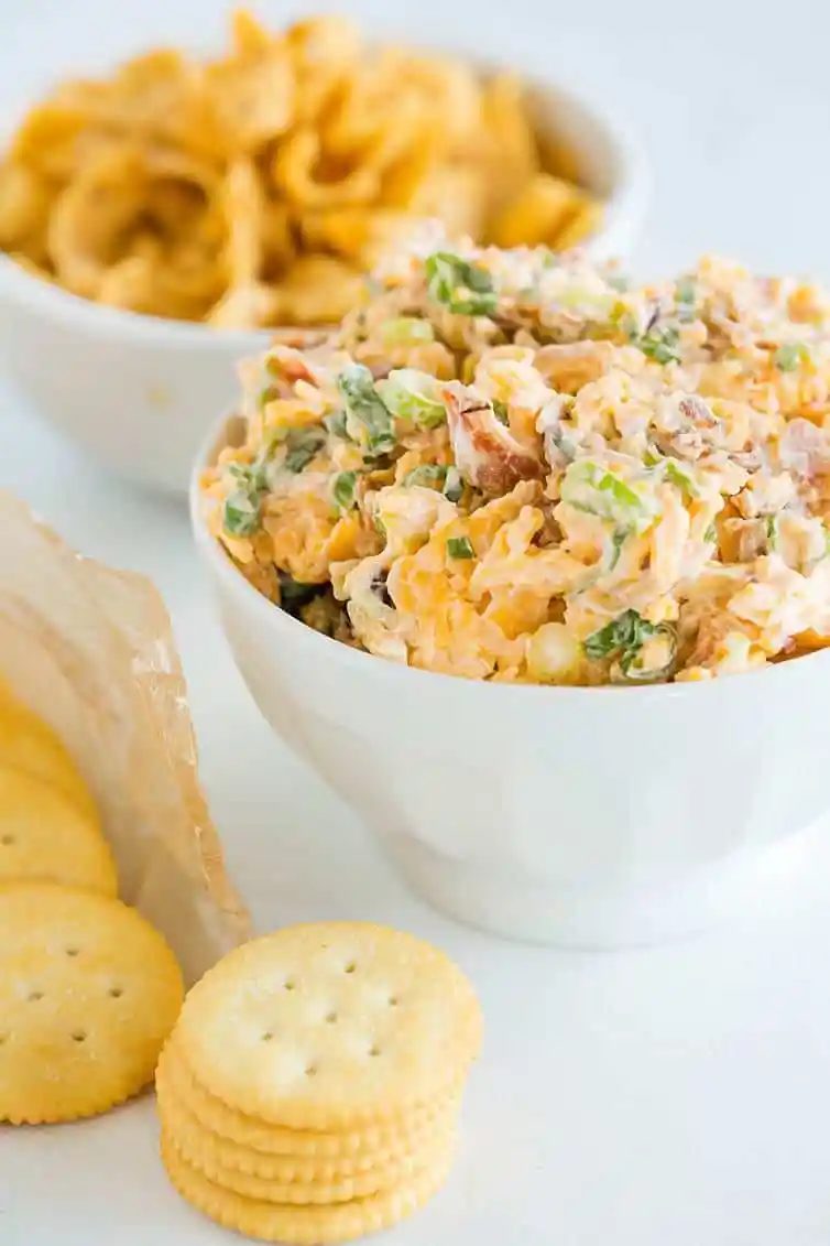 Neiman Marcus Dip - A speedy and straightforward combination of bacon, cheddar, scallions, mayo, toasted almonds and hot sauce!