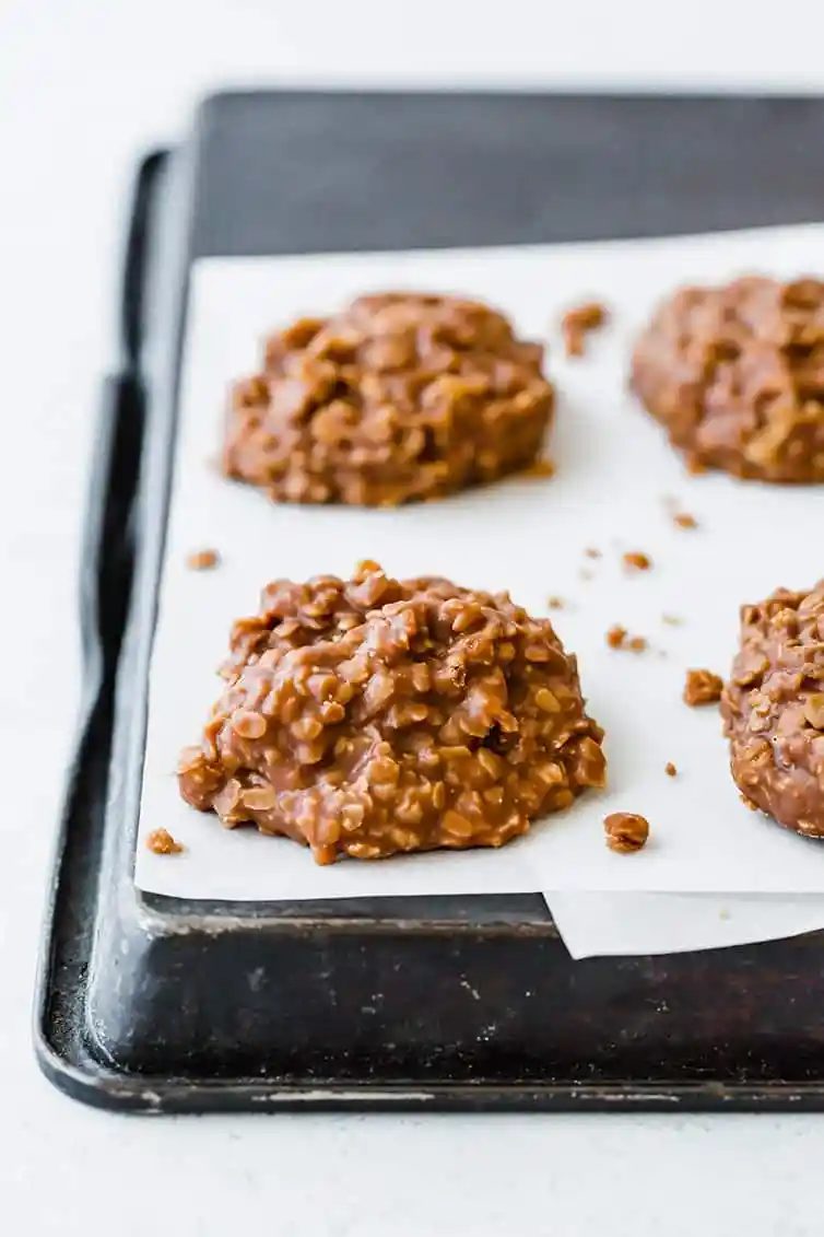 No bake cookies on parchment paper cooling.
