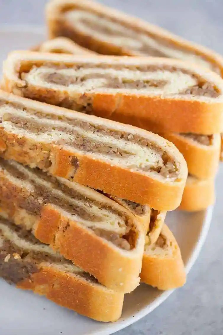 A plate with slices of nut roll.