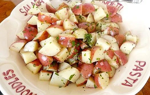 Potato salad in a serving bowl.