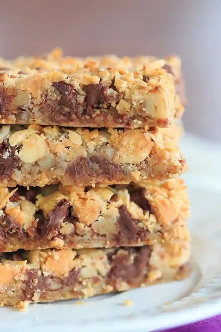 Seven Layer Bars, aka Magic Bars - Seven glorious layers of graham crackers, nuts, chocolate chips, white chocolate chips, butterscotch chips, coconut and sweetened condensed milk! |