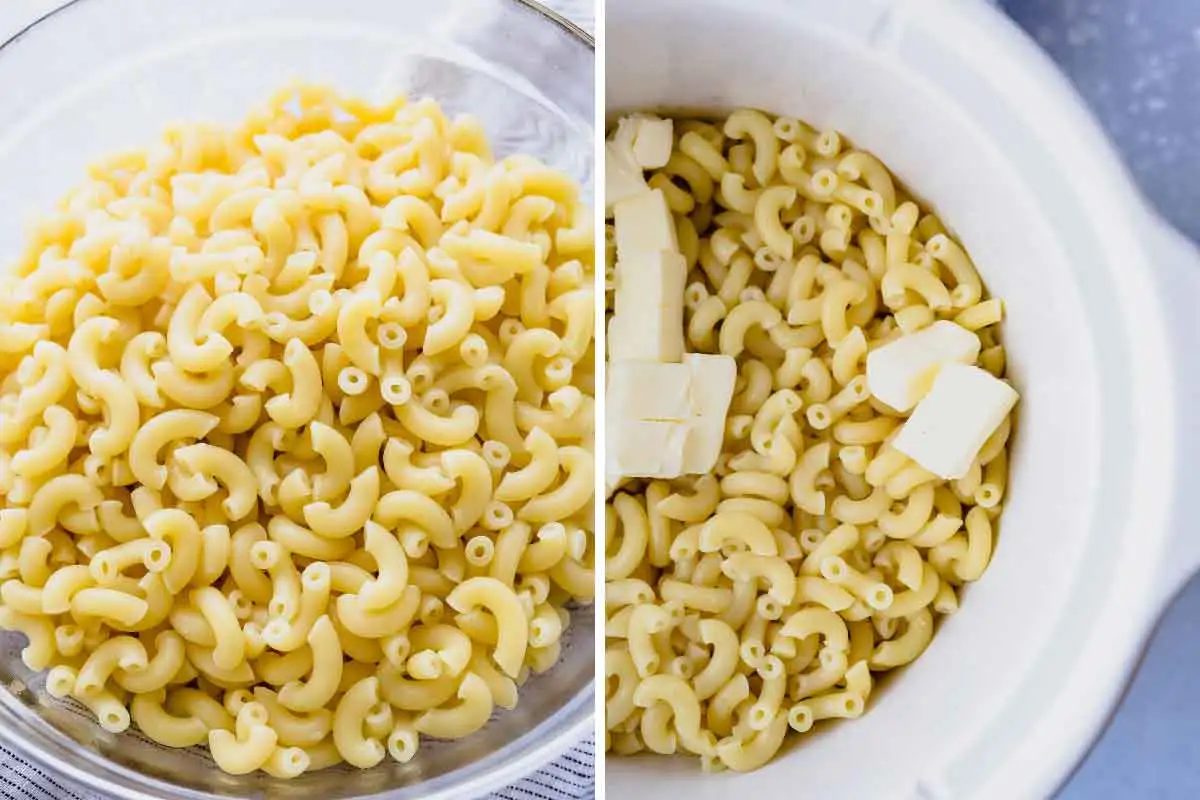 Cooked elbow macaroni noodles in a slow cooker with pads of butter on top.
