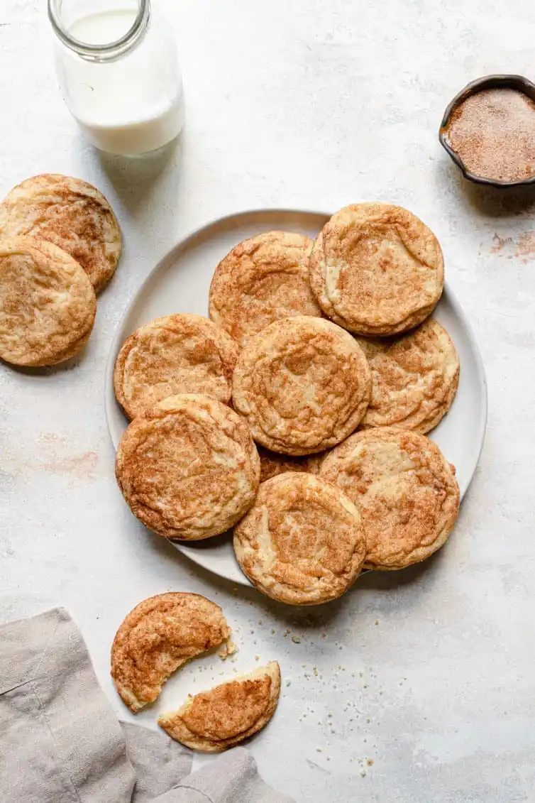 An overhead photo of a plate full of snickerdoodle cookies.