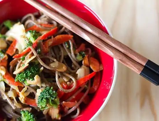 Soba Noodle Stir-Fry, served with Spicy Almond Butter Sauce