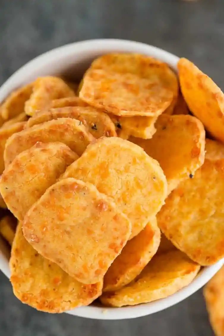 A closeup shot of from-scratch cheese crackers.
