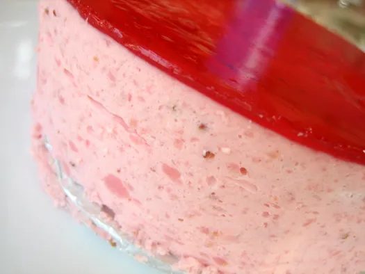 Side view of strawberry mirror cake.