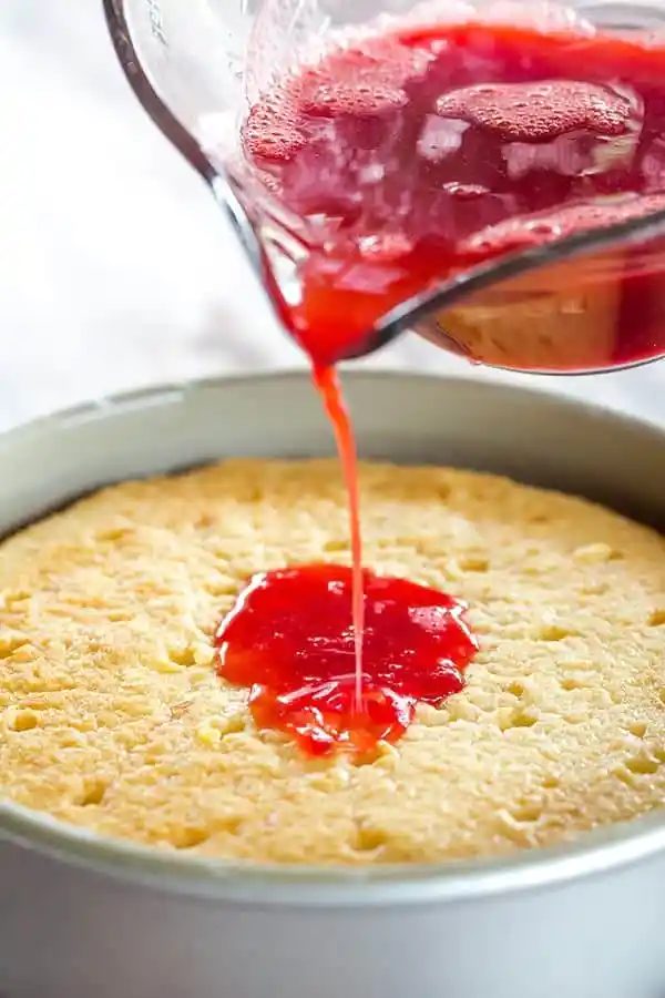 Strawberry Poke Cake - A two-layer beauty with the most memorable fresh sweet whipped cream. A reliable summer celebration cake!