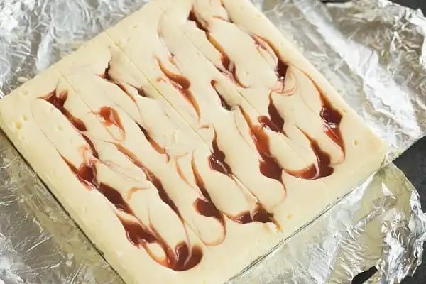 Strawberry Swirl Cheesecake Bars