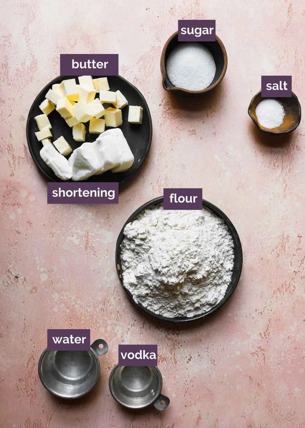 Ingredients for pie crust prepped on a counter and labeled.