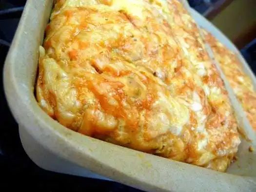 Three cheese beer bread in a loaf pan.