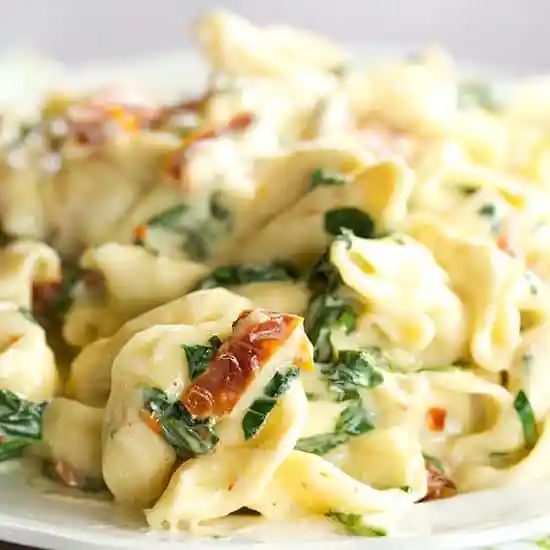 Tortellini in Parmesan Cream Sauce plus Spinach and Sun-Dried Tomatoes