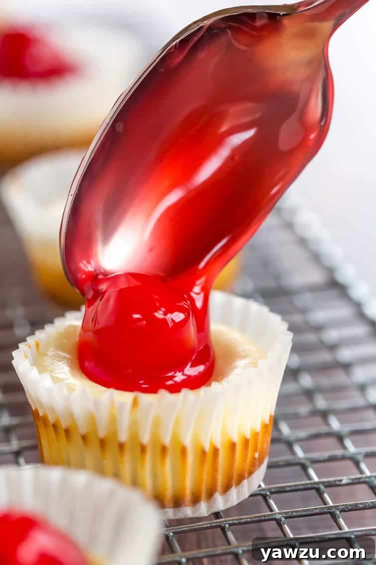 Close-up of Mini Cherry Cheesecake Bites in Muffin Liners