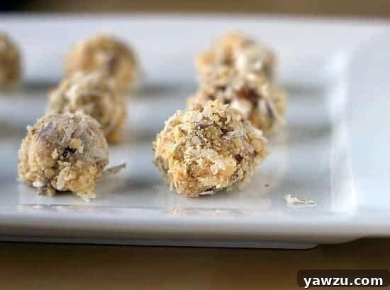 Delicious date, coconut, and walnut truffles on a ceramic serving tray, perfect for holiday gatherings.