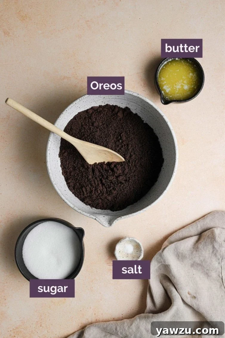 ingredients for the oreo crumb crust, including ground oreos, sugar, salt, and melted butter