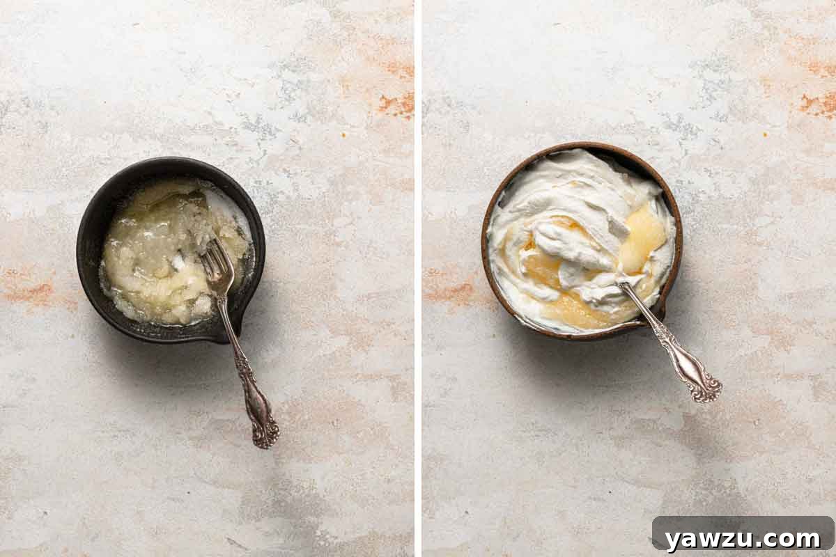 Mixing together butter, sugar, and sour cream for the start of king cake dough.