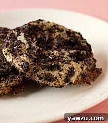 2 Oreo cheesecake cookies on a white plate.