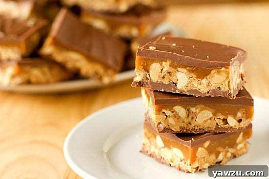 Homemade Snickers Bars: Chewy Caramel, Nougat, Peanuts, and Chocolate