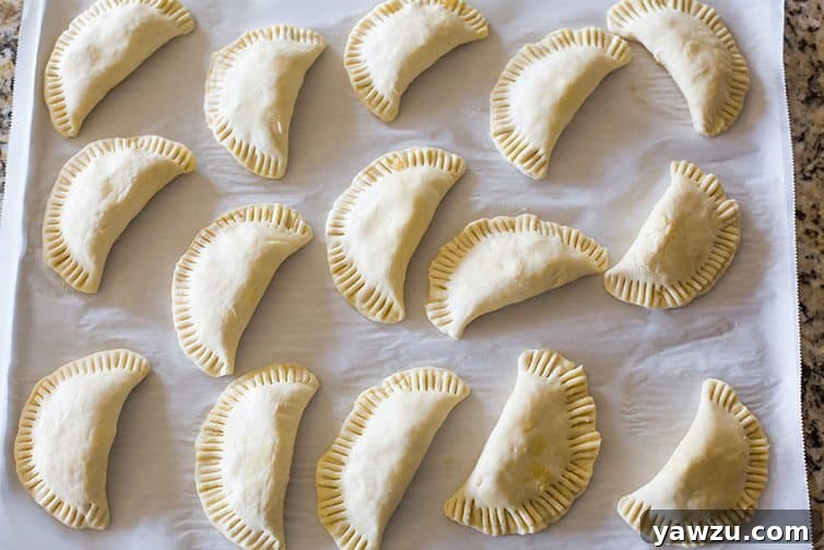 Assembled Apple Hand Pies, sealed and ready for the oven.