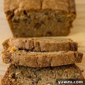 A loaf of zucchini pineapple bread sliced.