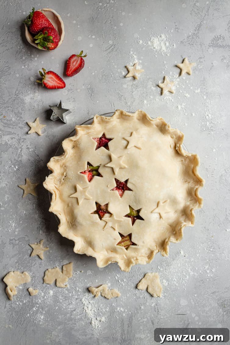 Assembled strawberry rhubarb pie before baking.
