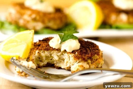 Golden-brown Crab Cakes served with a creamy Zesty Remoulade Sauce