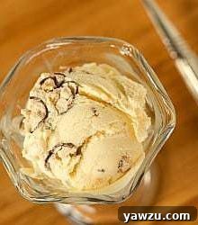 Overhead image of malted milk ice cream in a glass.