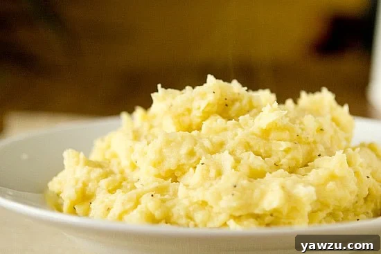 Creamy and fluffy Perfect Mashed Potatoes recipe, an indispensable comfort food.