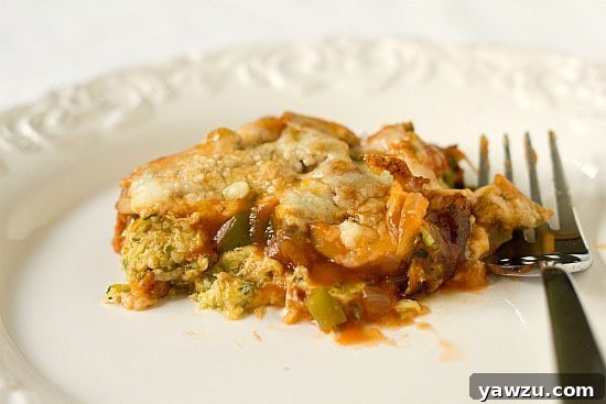 Garden Zucchini Pizza Casserole - A hearty dish featuring fresh zucchini, cheese, and a savory topping, baked to golden perfection.