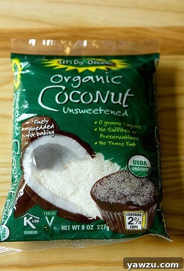 A bag of unsweetened shredded coconut, an essential ingredient for balancing the sweetness in Congo Bars.