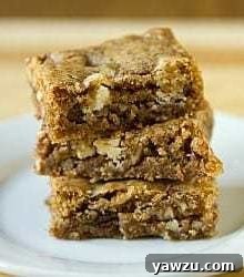 Stack of 3 congo bars on a white plate, ready to be enjoyed.