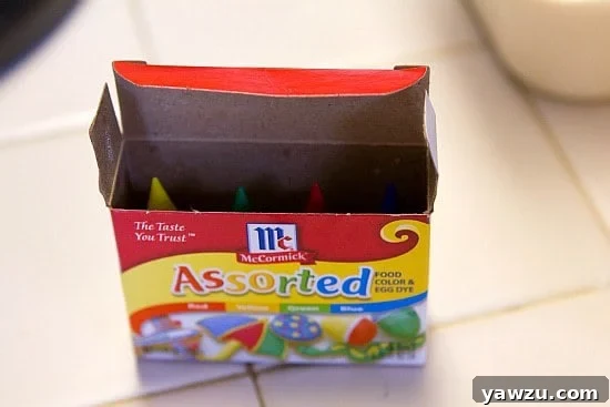 Assortment of liquid food coloring bottles in various colors