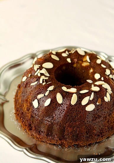 Golden brown Honey Cake, beautifully baked in a bundt pan and ready for celebration