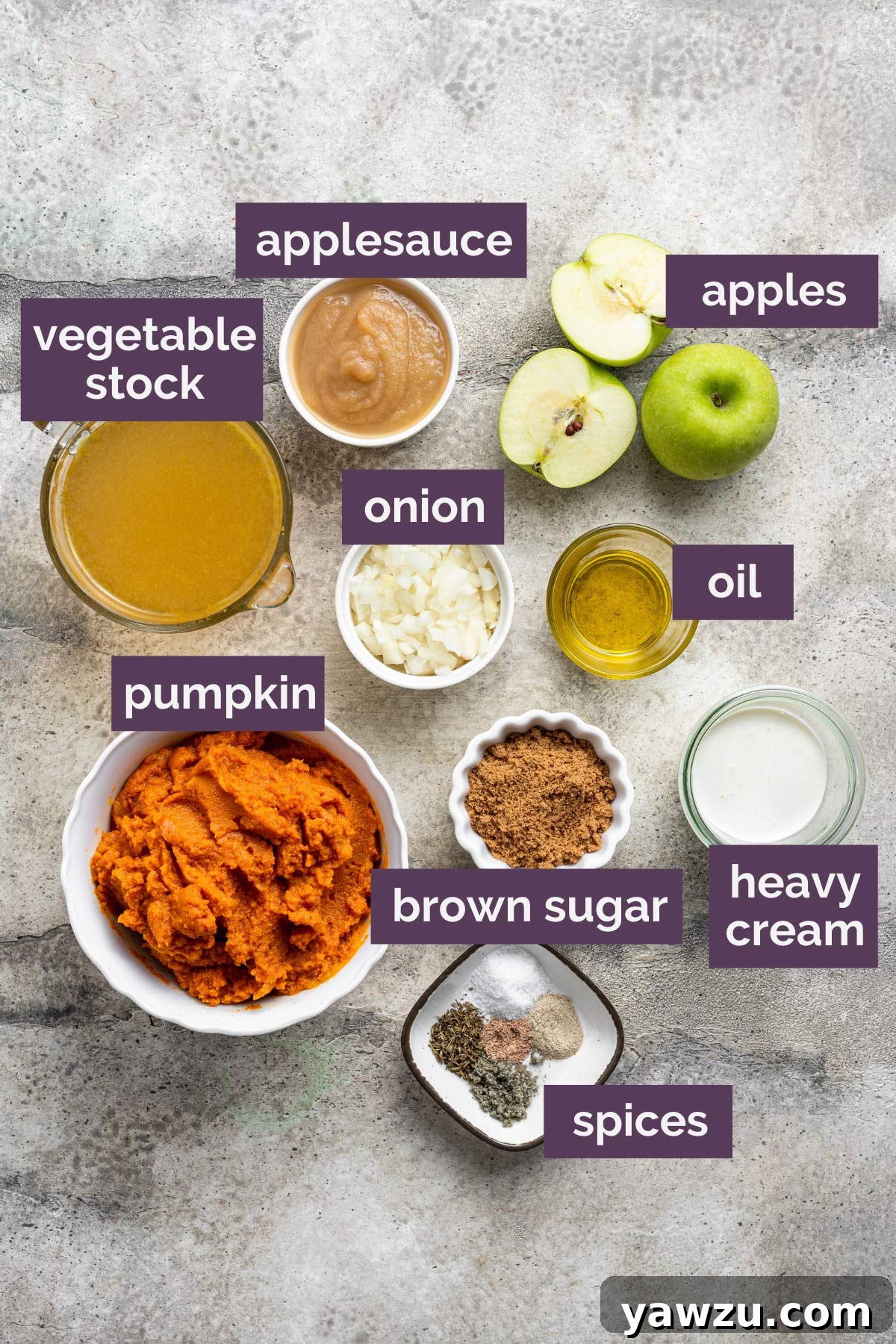 Ingredients for pumpkin soup prepped on the counter and labeled.