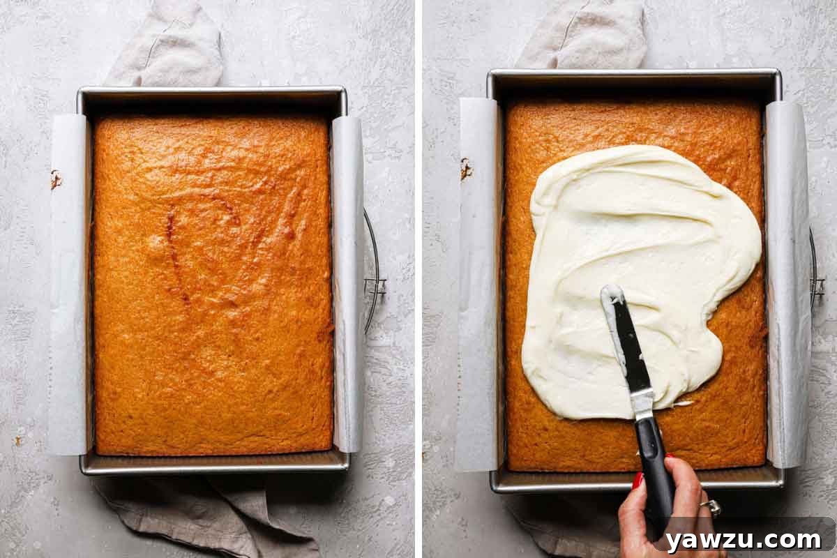 Cream cheese frosting being spread on top of baked pumpkin cake.