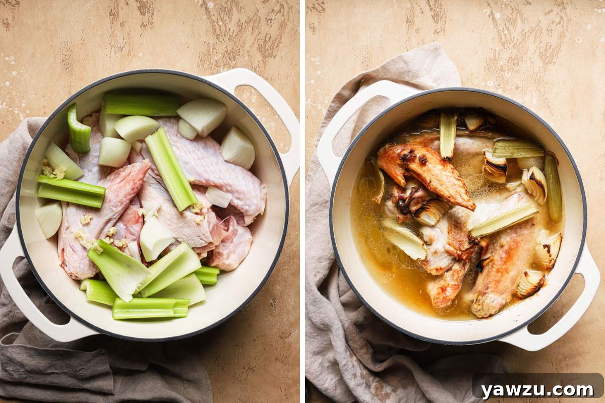 Turkey wings and aromatics roasted in a Dutch oven, showing a rich, caramelized fond at the bottom.