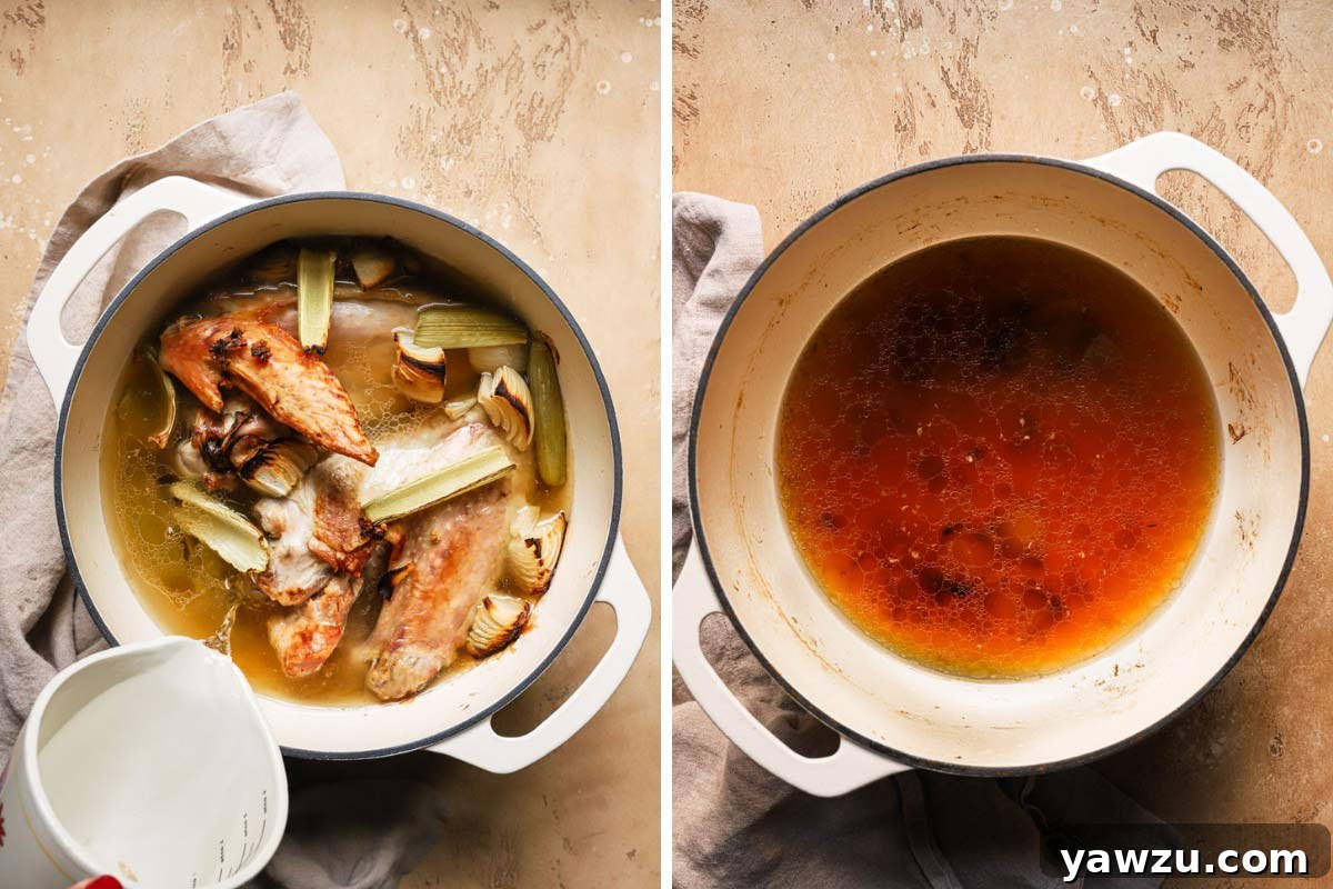 Fully cooked homemade turkey stock in a Dutch oven after simmering, ready for straining.